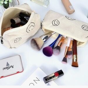 Lyanyan 2 Piece Makeup Bag Set in Beige Corduroy with a Black Smiley Face Print